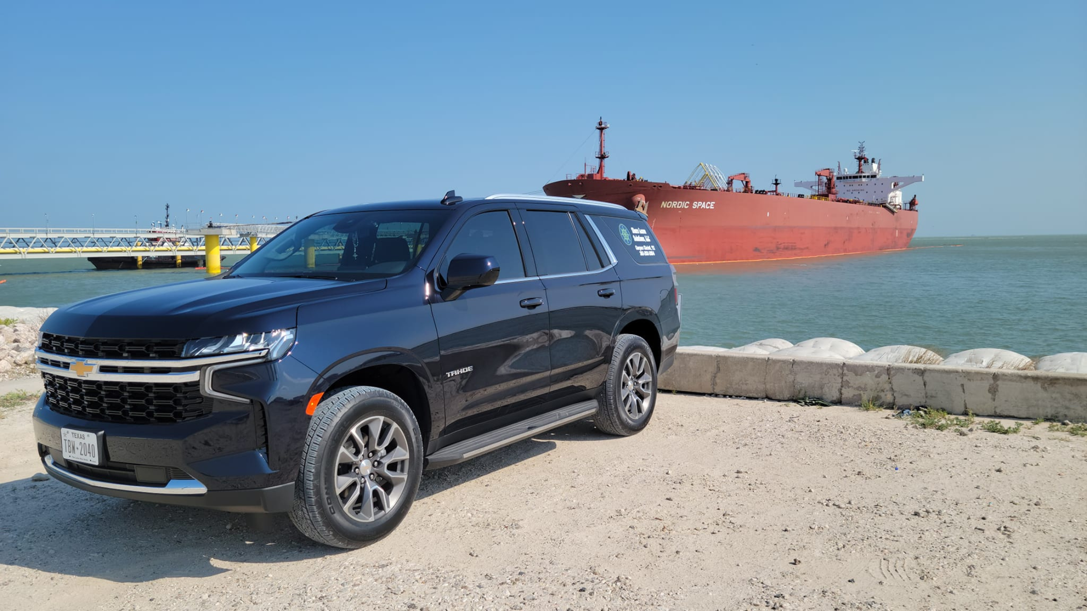 Shore Leave Solutions LLC Vehicle in front of the sea port