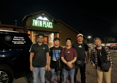 Seafarer Clients of Shore Leave Solutions LLC posing infront of Twin Peaks in cristi corpus