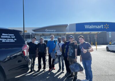 Seafarer Clients of Shore Leave Solutions LLC posing infront of Walmart in cristi corpus