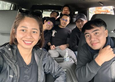 Seafarer Clients of Shore Leave Solutions LLC posing inside the company vehicle in cristi corpus