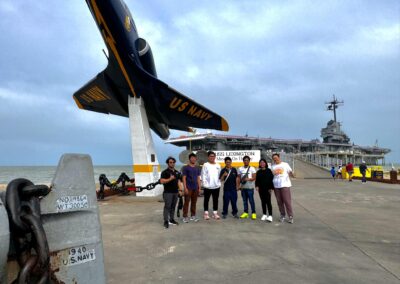 Seafarer Clients of Shore Leave Solutions LLC posing at USS Lexington Museum of the Bay in cristi corpus