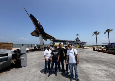 Seafarer Clients of Shore Leave Solutions LLC posing at USS Lexington Museum of the Bay in cristi corpus