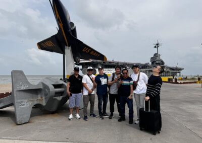 Seafarer Clients of Shore Leave Solutions LLC posing at USS Lexington Museum of the Bay in cristi corpus