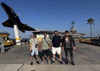 Seafarer Clients of Shore Leave Solutions LLC posing at USS Lexington Museum of the Bay in cristi corpus