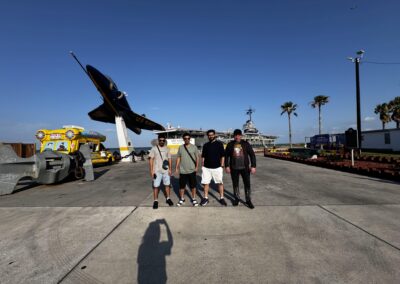 Seafarer Clients of Shore Leave Solutions LLC posing at USS Lexington Museum of the Bay in cristi corpus