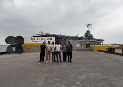 Seafarer Clients of Shore Leave Solutions LLC posing at USS Lexington Museum of the Bay in cristi corpus